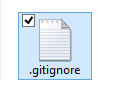 Windows Explorer showing the successfully renamed file as ".gitignore" after confirming the file extension change, showing how the trailing period has been removed