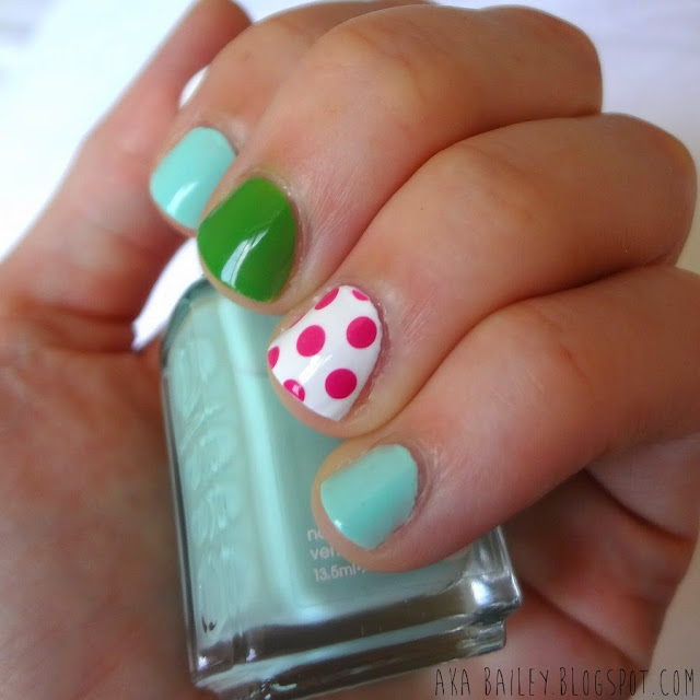Essie Mint Candy Apple, with bright green and hot pink polka dot accent nails, perfect summer nails