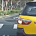 Bike knocked clean out from under woman by a car