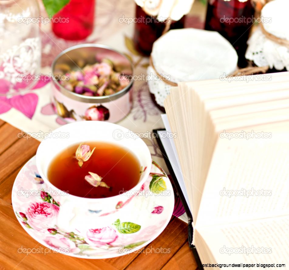 Cup of tea and a book on the table — Stock Photo © chica chica Cup of tea and a book on the table — Stock Photo © chica chica
