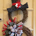 Totally awesome snowman grapevine wreath for winter and Christmas.