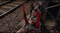 arms bursting out of the belly in baby blood (1990)