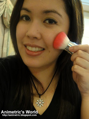 Applying Skin Food Peach Sake Silky Finish Powder