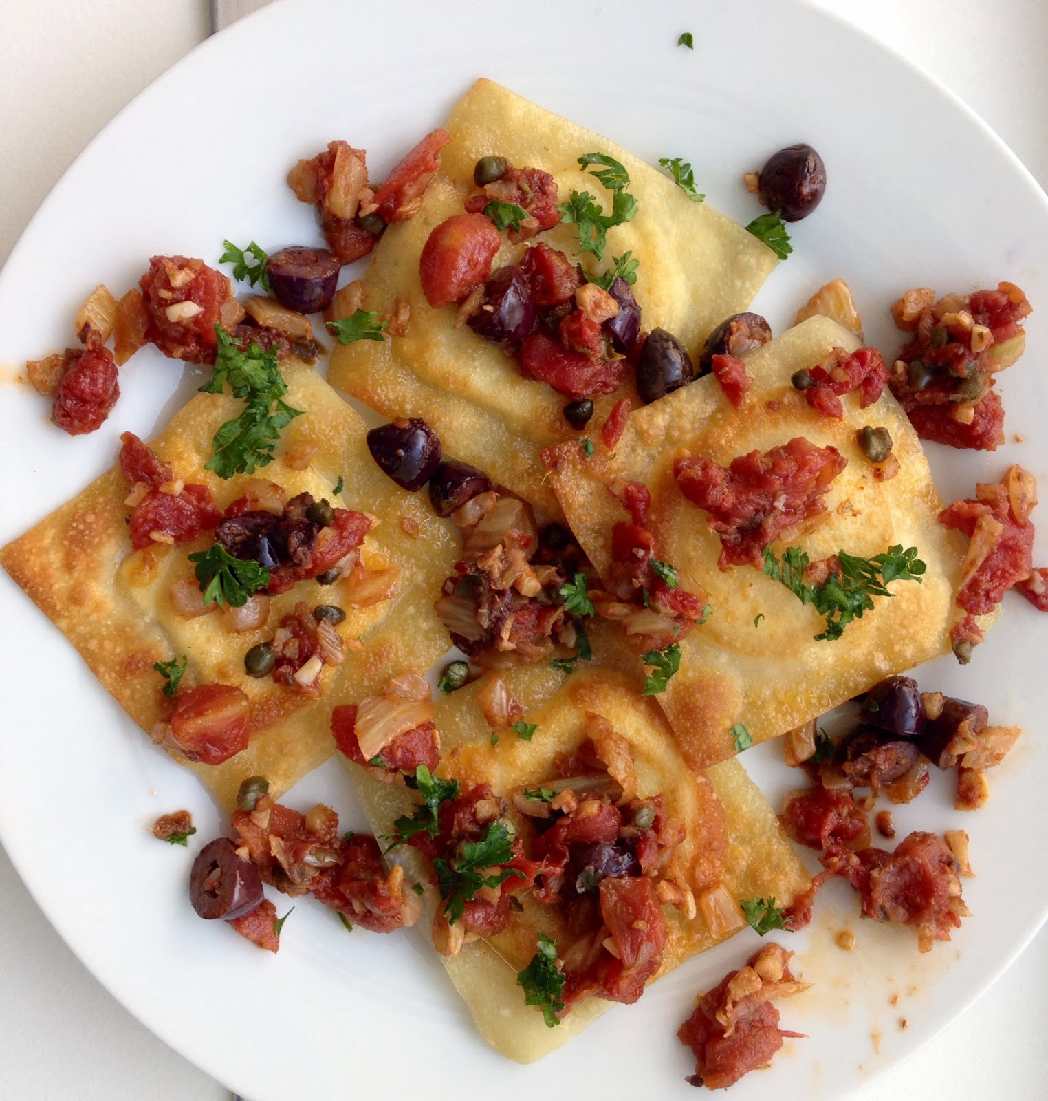 lovesmiths Goat Cheese Ravioli with Puttanesca Sauce