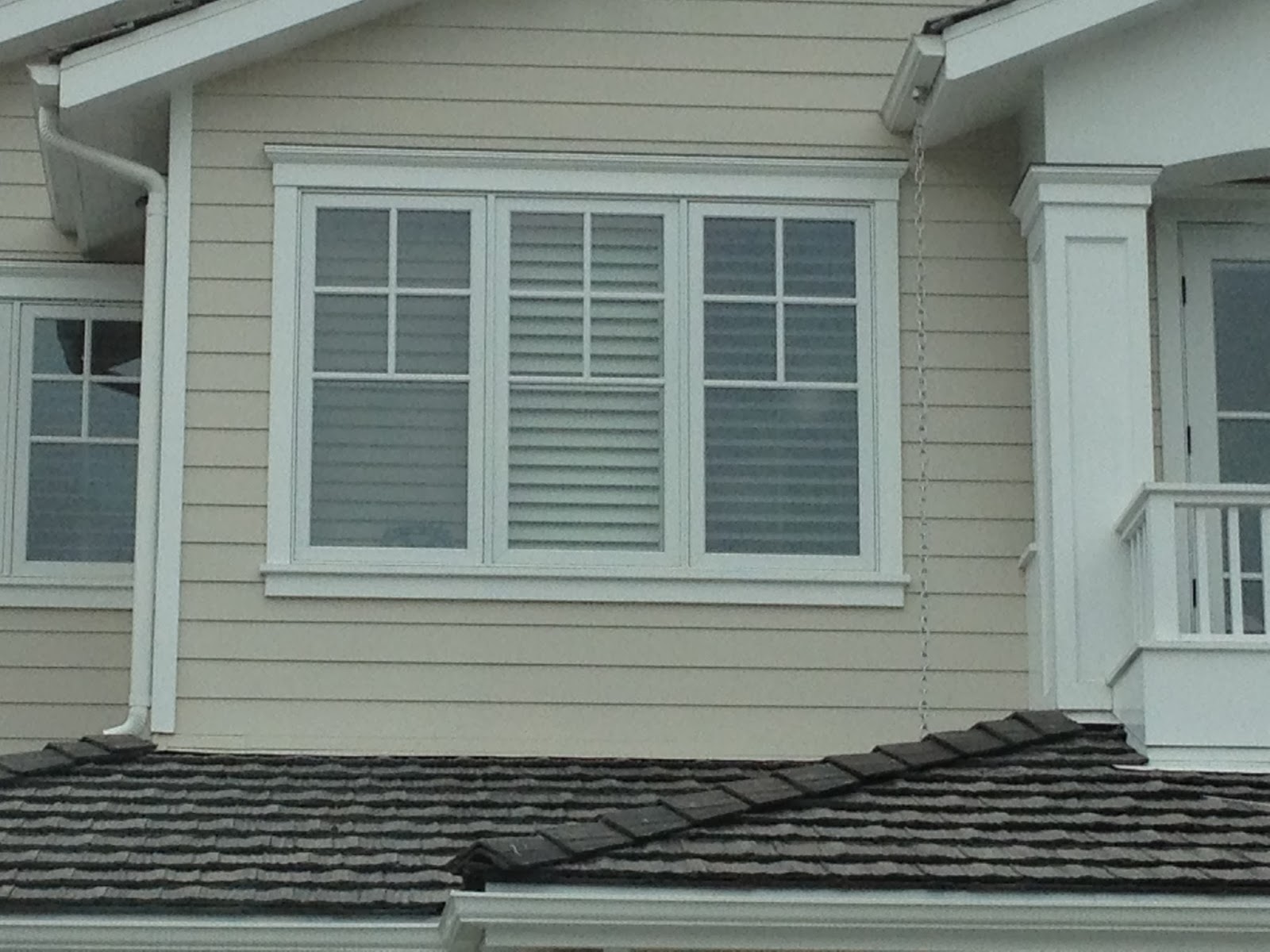 The Cape Cod Ranch Renovation More Windows, Tile & Wood...