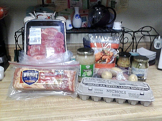 Ingredients for German Menu Bacon Eggs Beef Sauerkraut Potatoes Onion Mustard Pickles