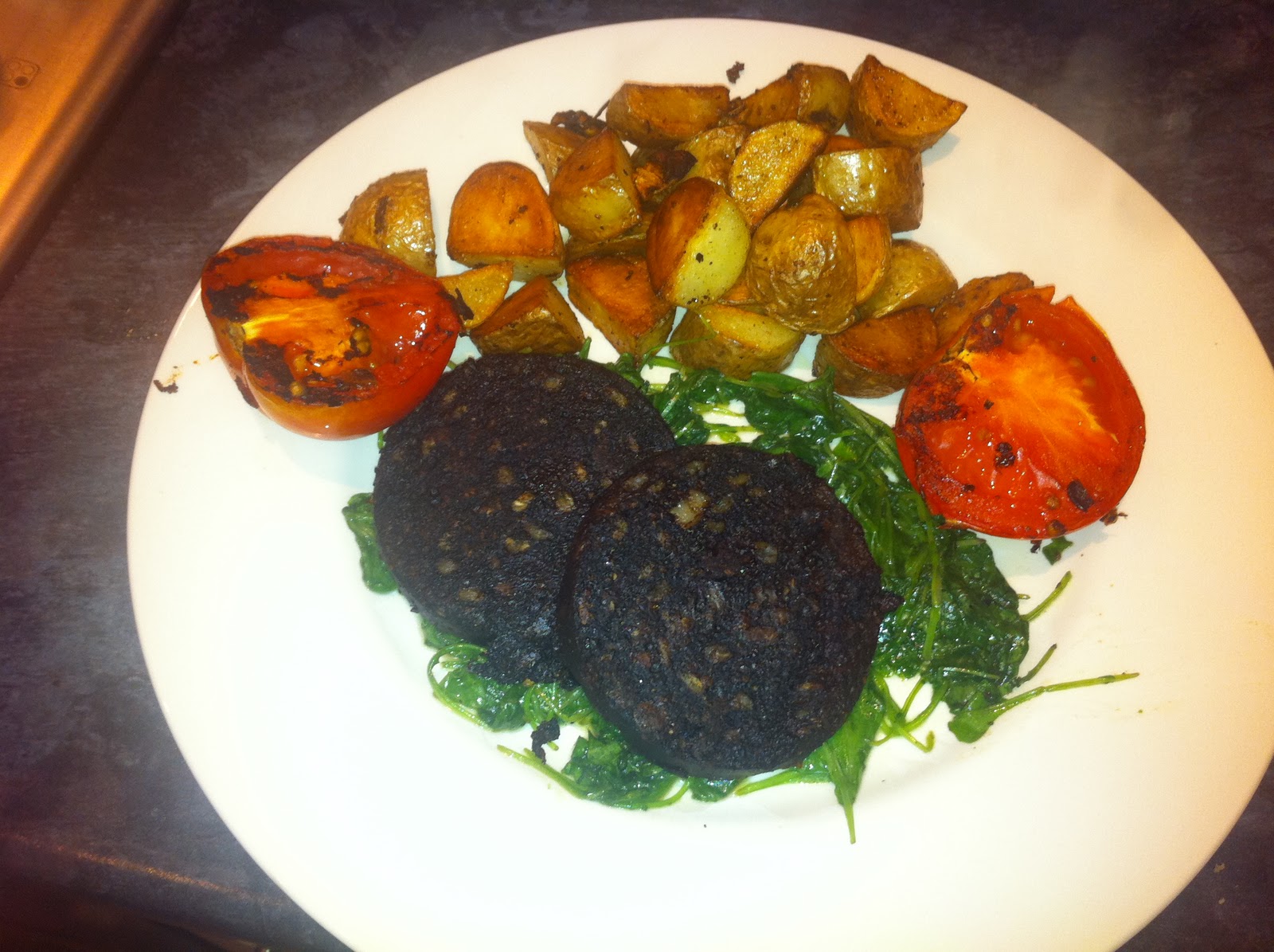 The lone gourmet A brunchy supper of black pudding on wilted rocket