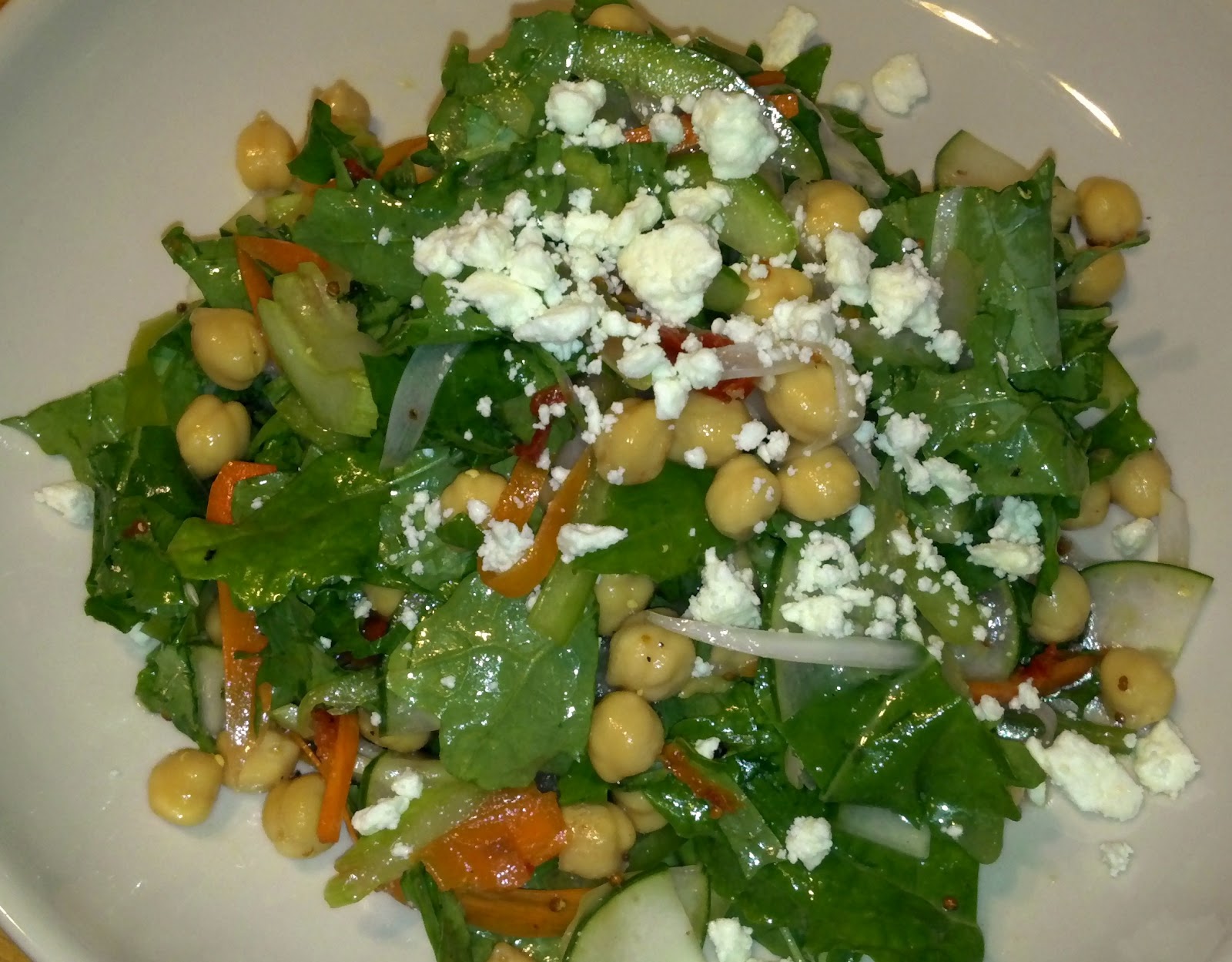 Kale and Caviar Raw White Russian Kale Salad with Garbanzos and Feta