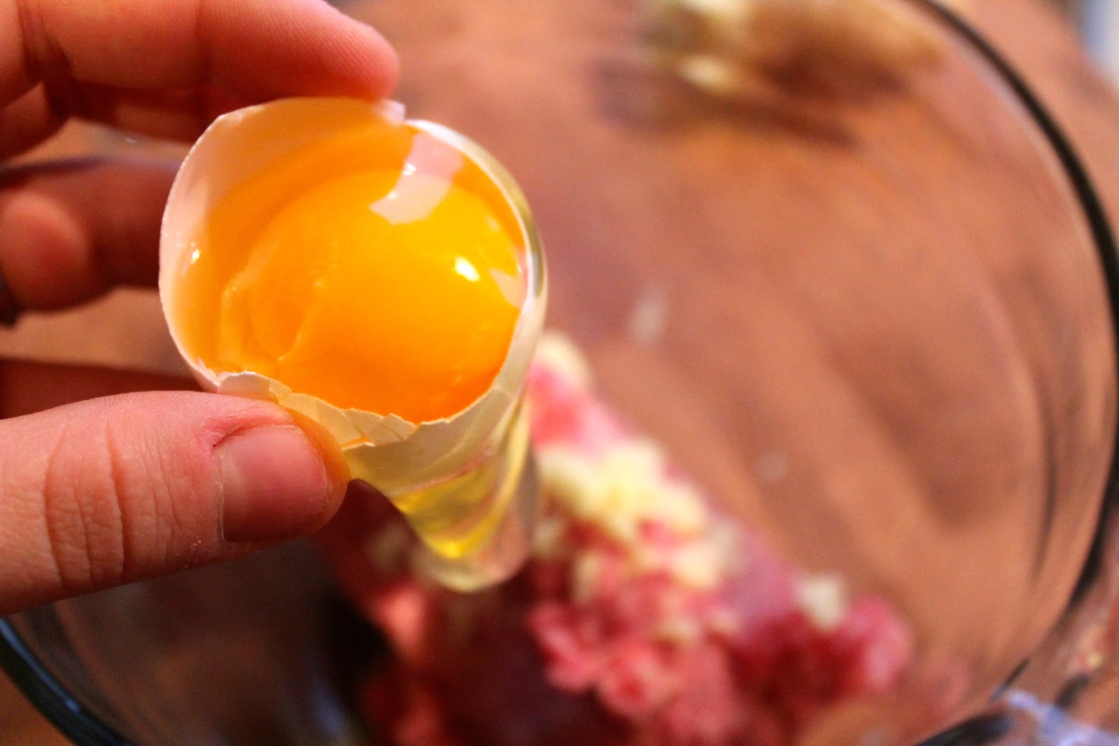 Crack in an egg. Yes, I'm aware I need a manicure. Focus on the food