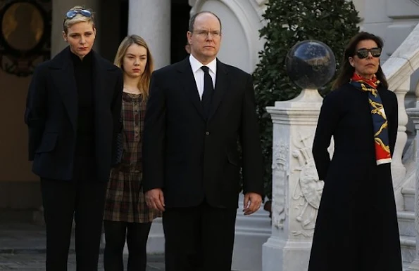 Prince Albert II of Monaco and Princess Charlene of Monaco, Princess Caroline of Hanover and Princess Alexandra observe a minute of silence on November 16, 2015 at the Monaco Palace in Monaco 