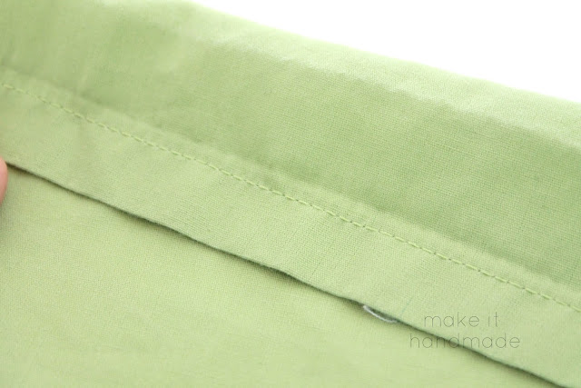 How to quickly 'un-hem' a sheet without wasting fabric!  I was giddy when I realized that ripping out that seam would take 30 seconds instead of 30 minutes! Tutorial by Make It Handmade.