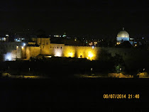 Night view of walls of Jerusalem, Dung Gate and Dome of the Rock Mosque in Jerusalem, Israel.