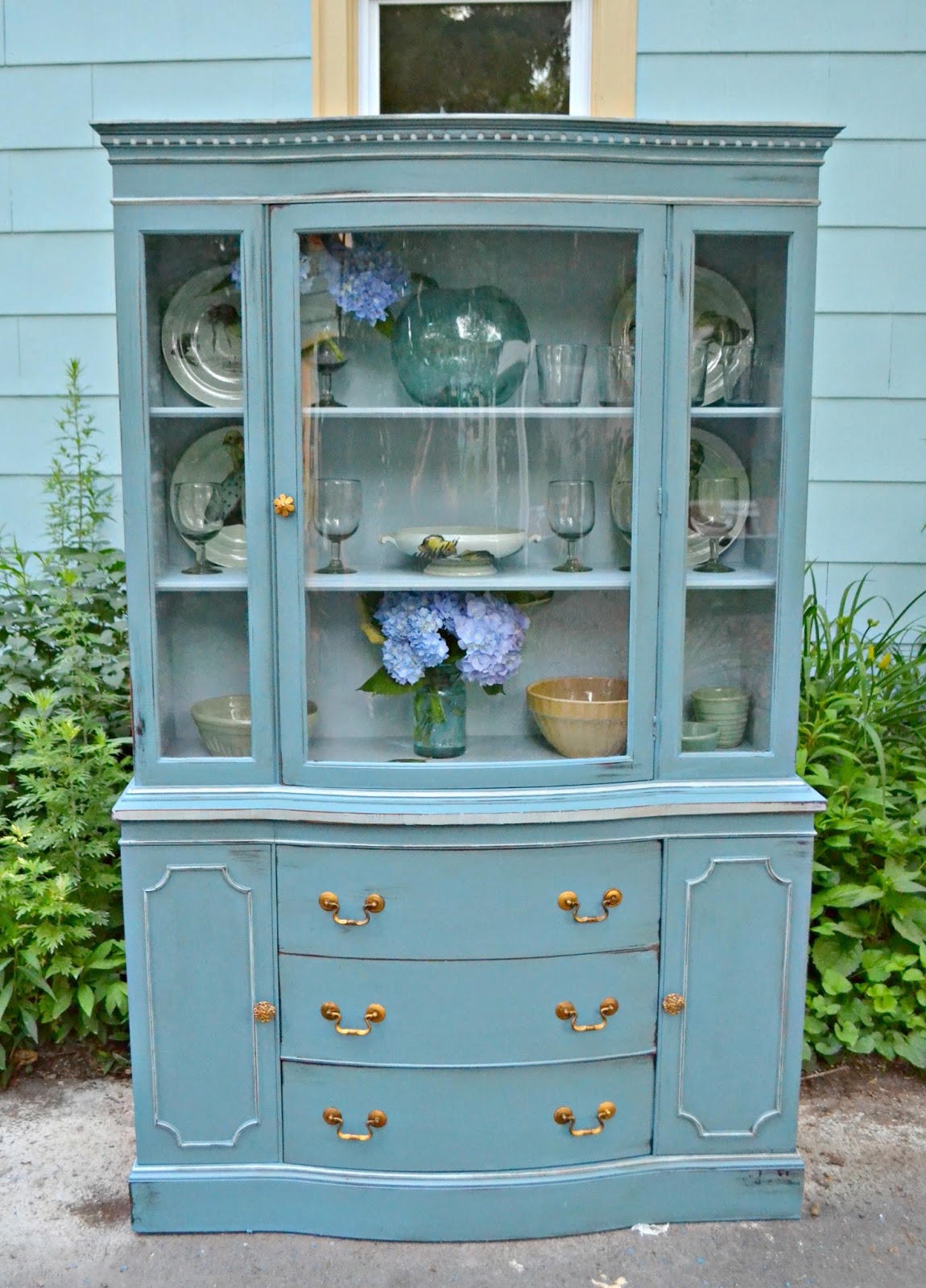 Heir and Space An Antique China Hutch in Blue