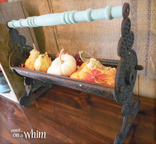 An antique Log Roller Upcycled as a Fall Centerpiece from Denise on a Whim