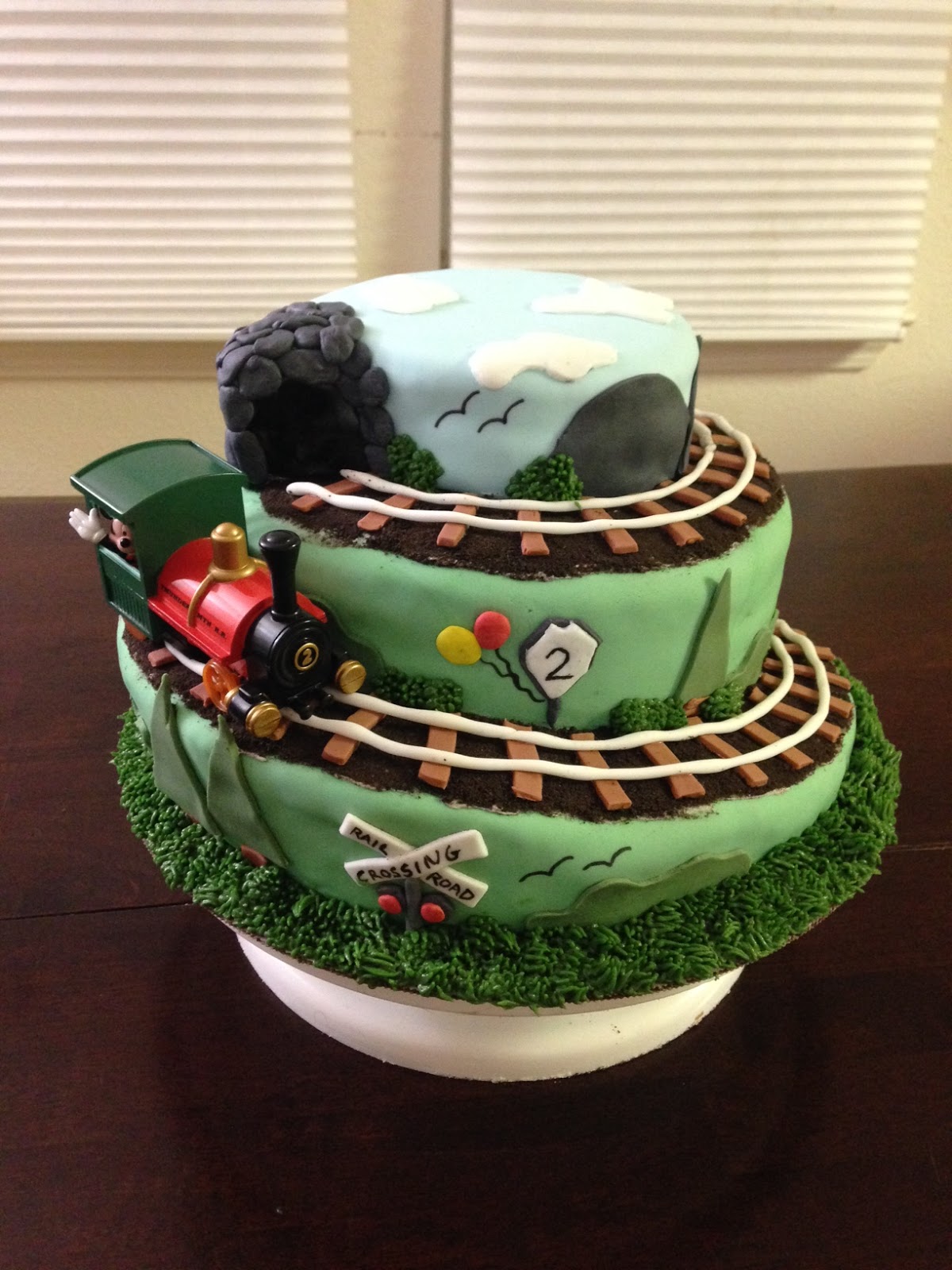 FROM ME TO YOU... Creating a tiered spiral cake with fondant decorations