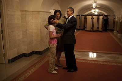 michelle with husband and daughter