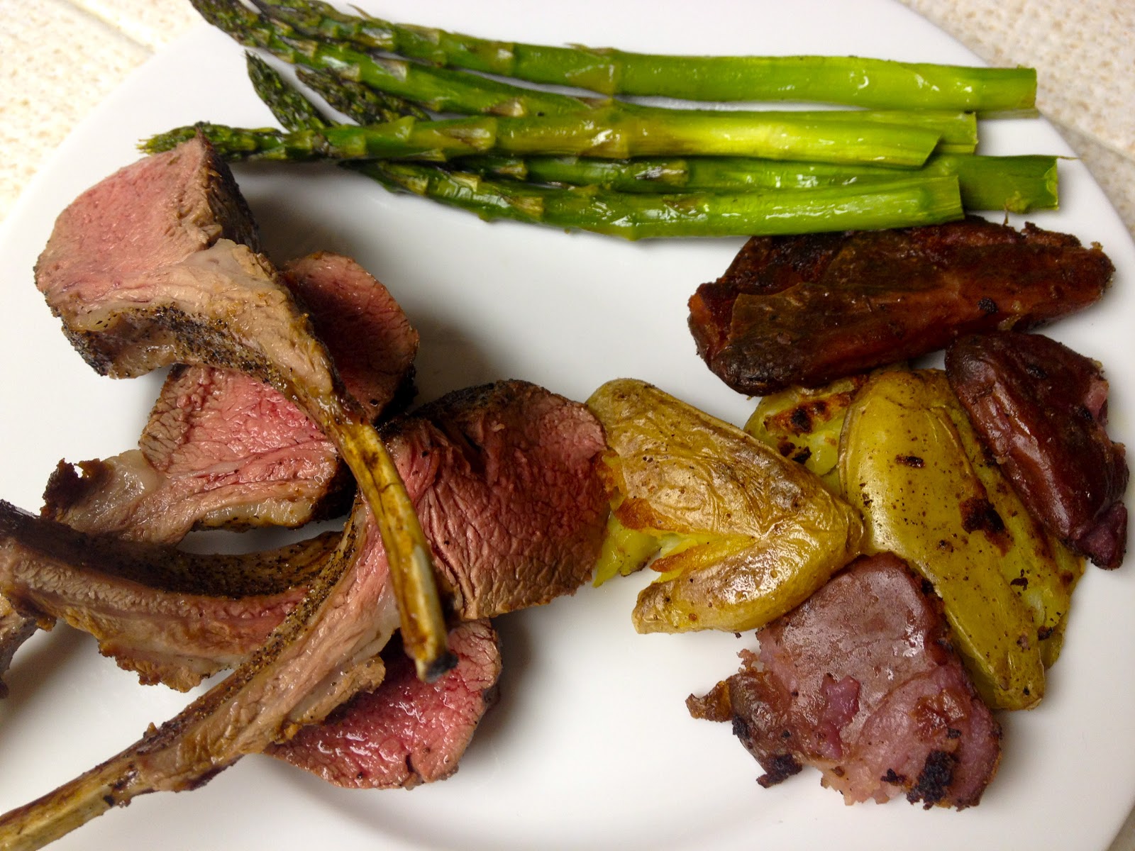 PanSeared OvenFinished Salt and Pepper Rack of Lamb with Crispy