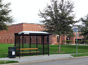 Example of Metro Bus Shelterthis one at a High School on Briar Forest . (metro bus stop line briar forest inbound bus shelter in front of westside high school houston texas )