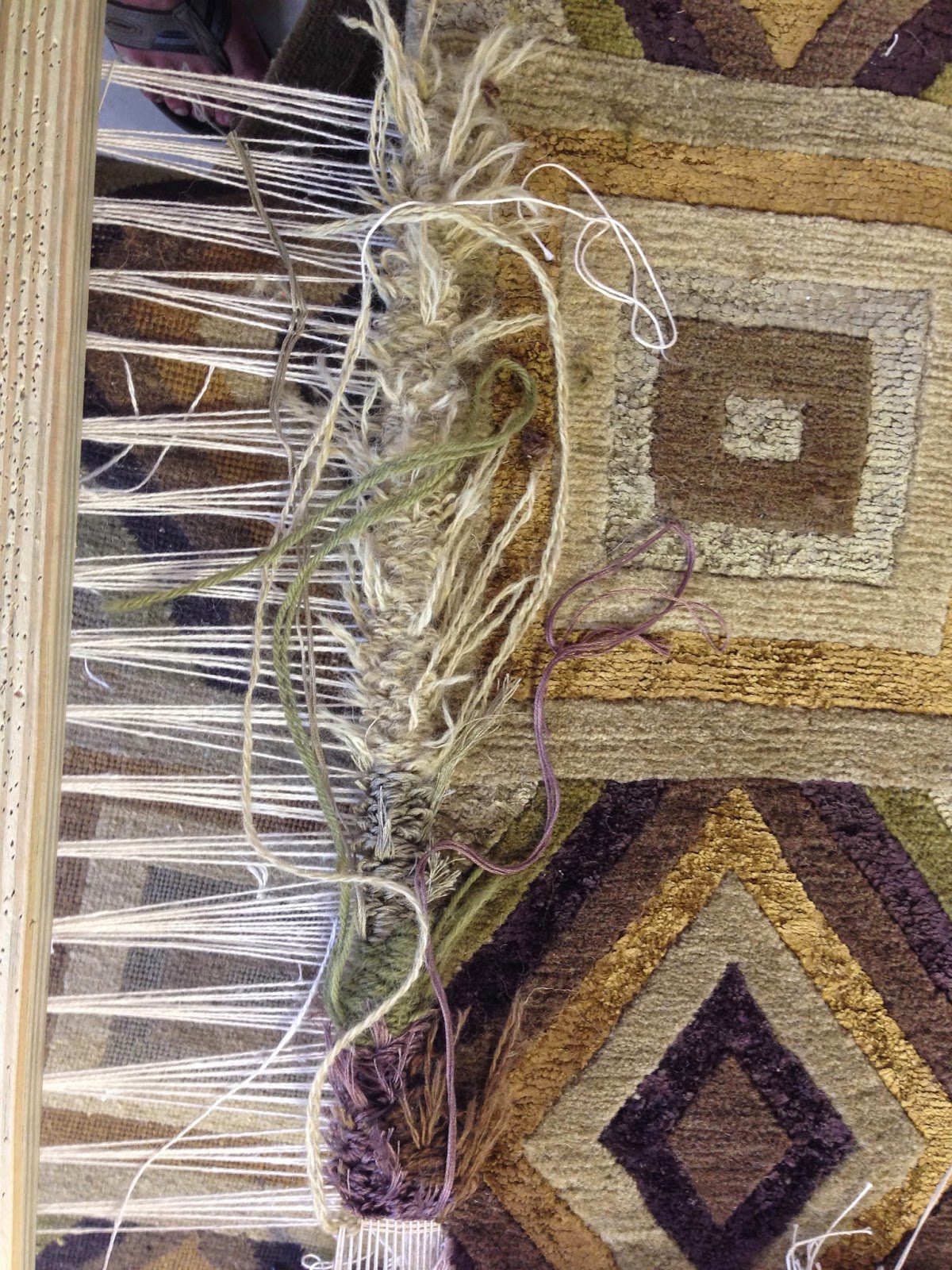 Kosker Traditional Rug Repair Hand knotted silk rug repair in progress