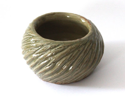 carved pottery bowl glazed