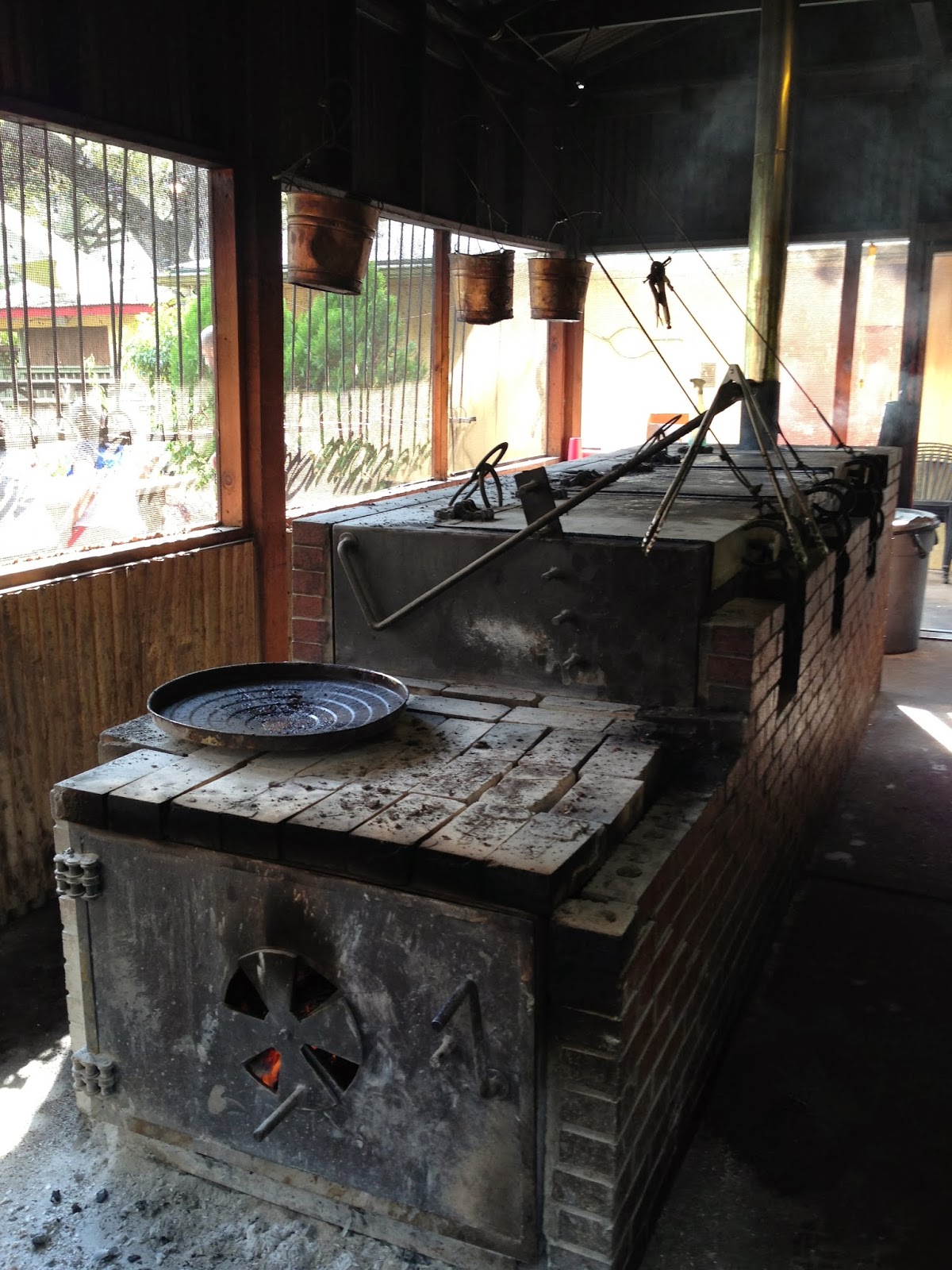 Man Up Tales of Texas BBQ™ The pit at Two Bros. BBQ Market (San