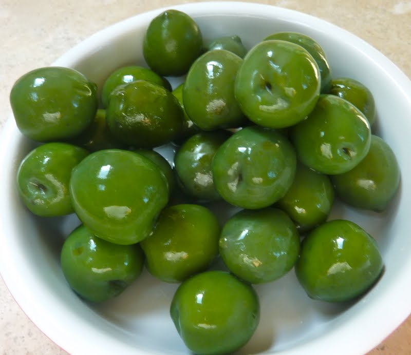 beurrista braised chicken thighs with castelvetrano olives & toasted almonds