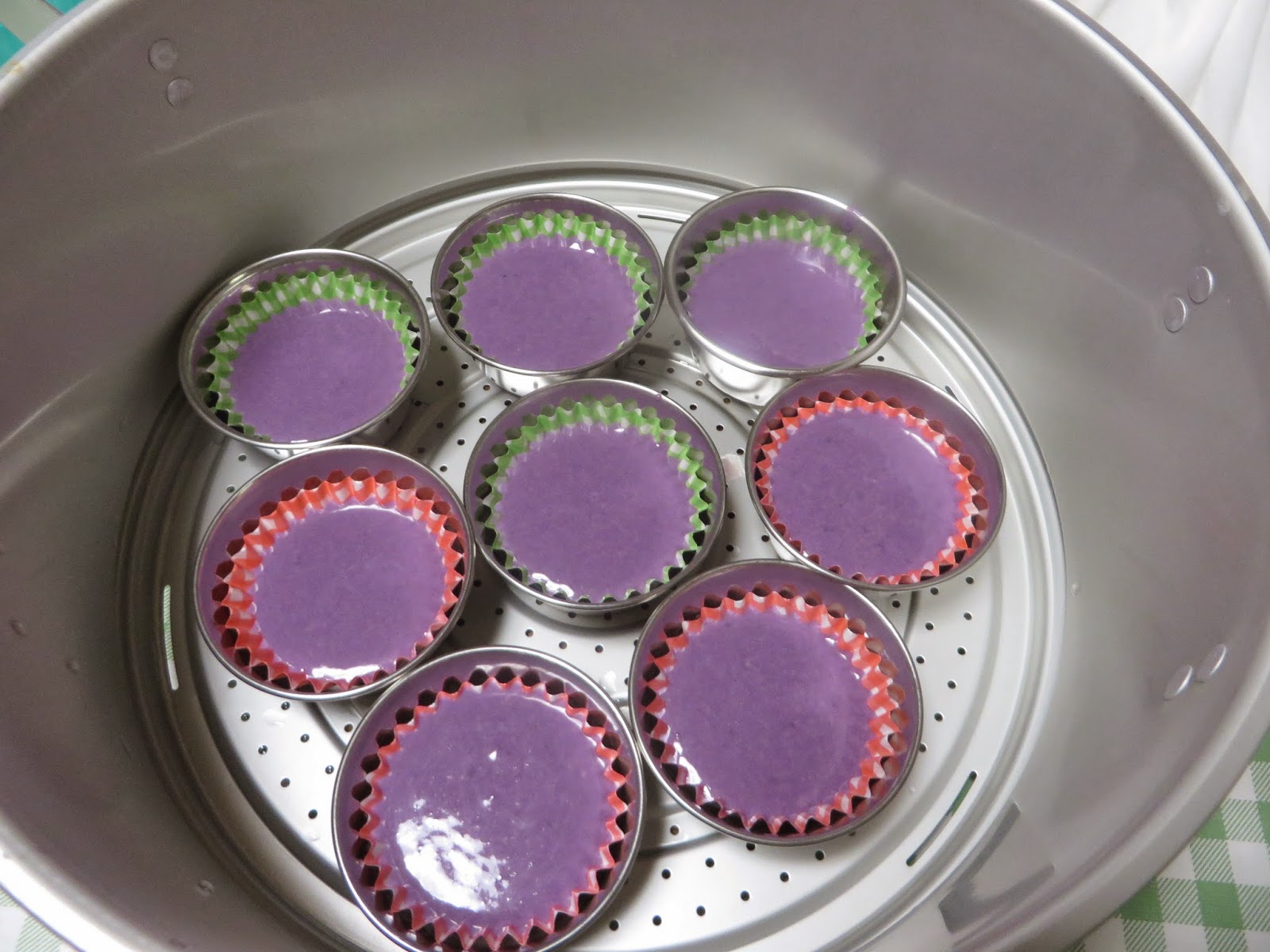 Cooking" "Puto Ube" (steamed rice cake)