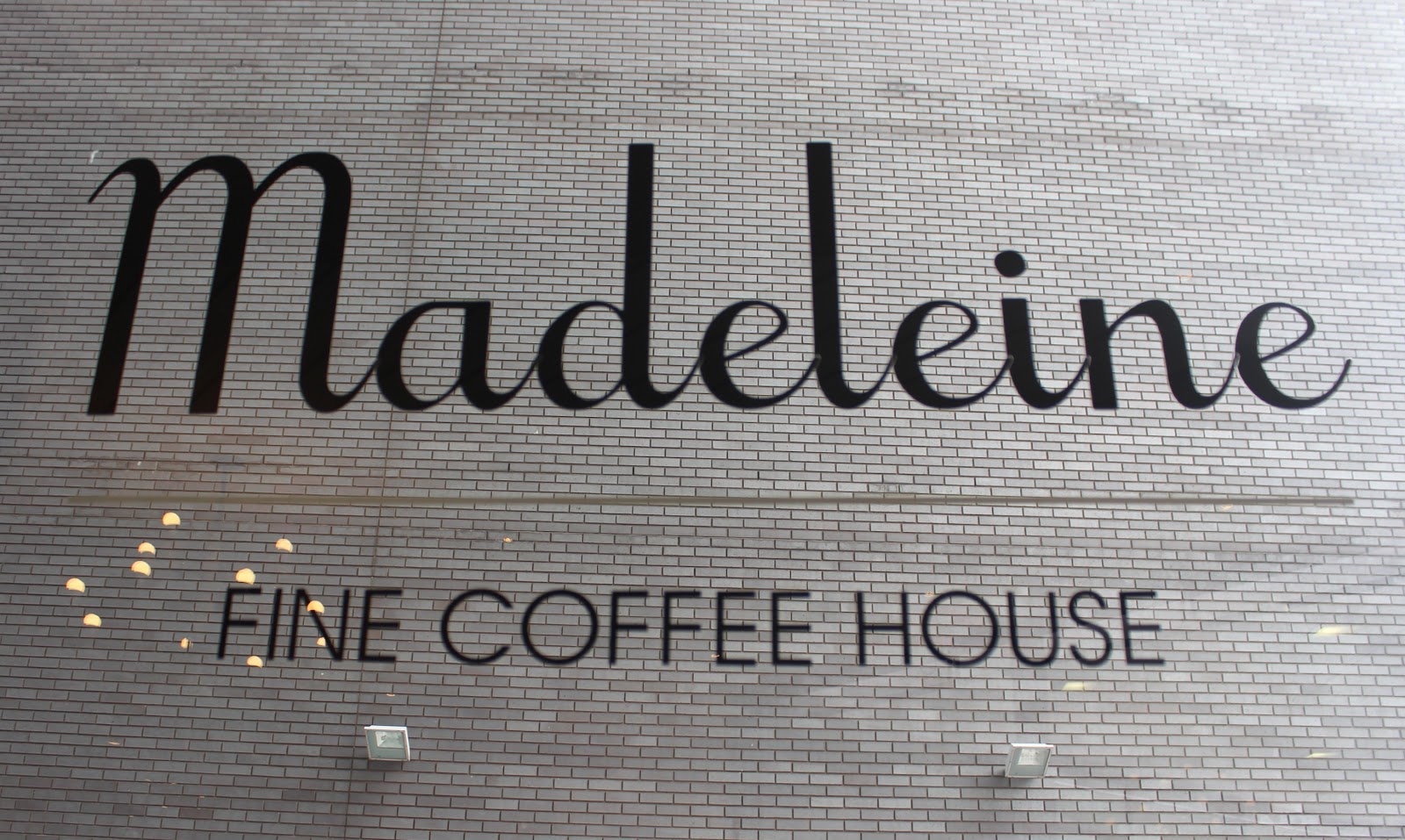 The window of Madeleine Coffee House at The Cube Birmingham