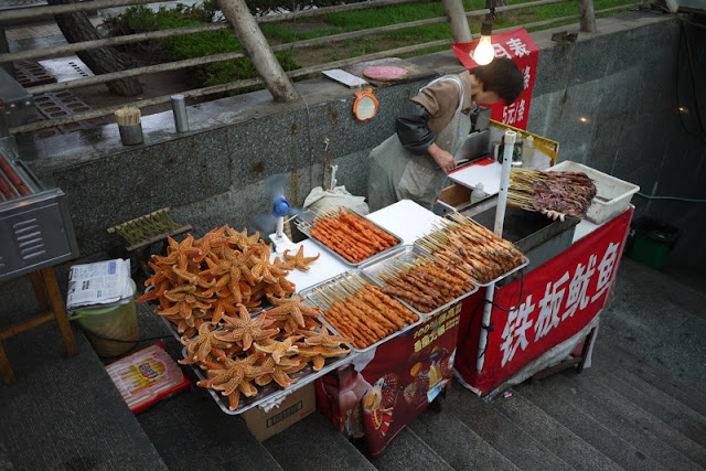 cart with food to grill and starfishes