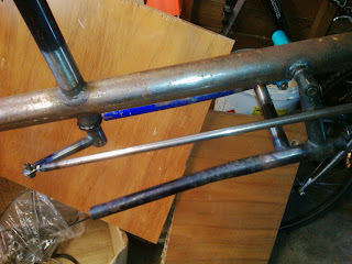 The bottom of the rear head tube and the stand.