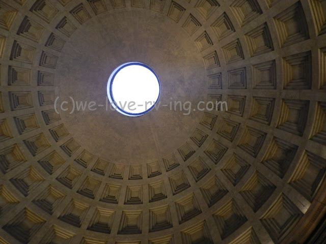 We look up thru the opening in the dome of the Pantheon