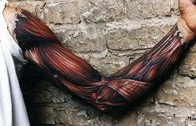 3D BROWN MUSCLE TATTOO ON ARM
