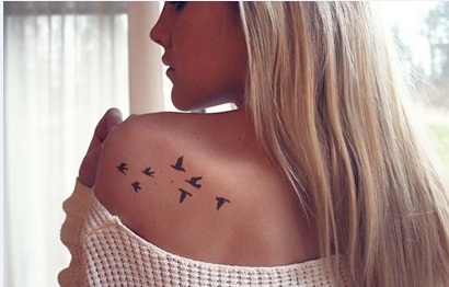tatuajes-peque%C%Bos-aves-espalda-