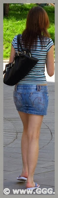 Girl wearing denim mini skirt 