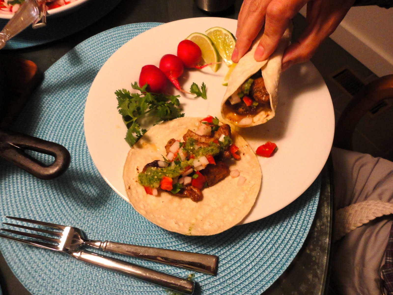 Sizzling Pork Tacos with Tomatillo Salsa and Salsa Crudo adapted from