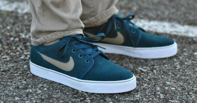 nike toki low leather