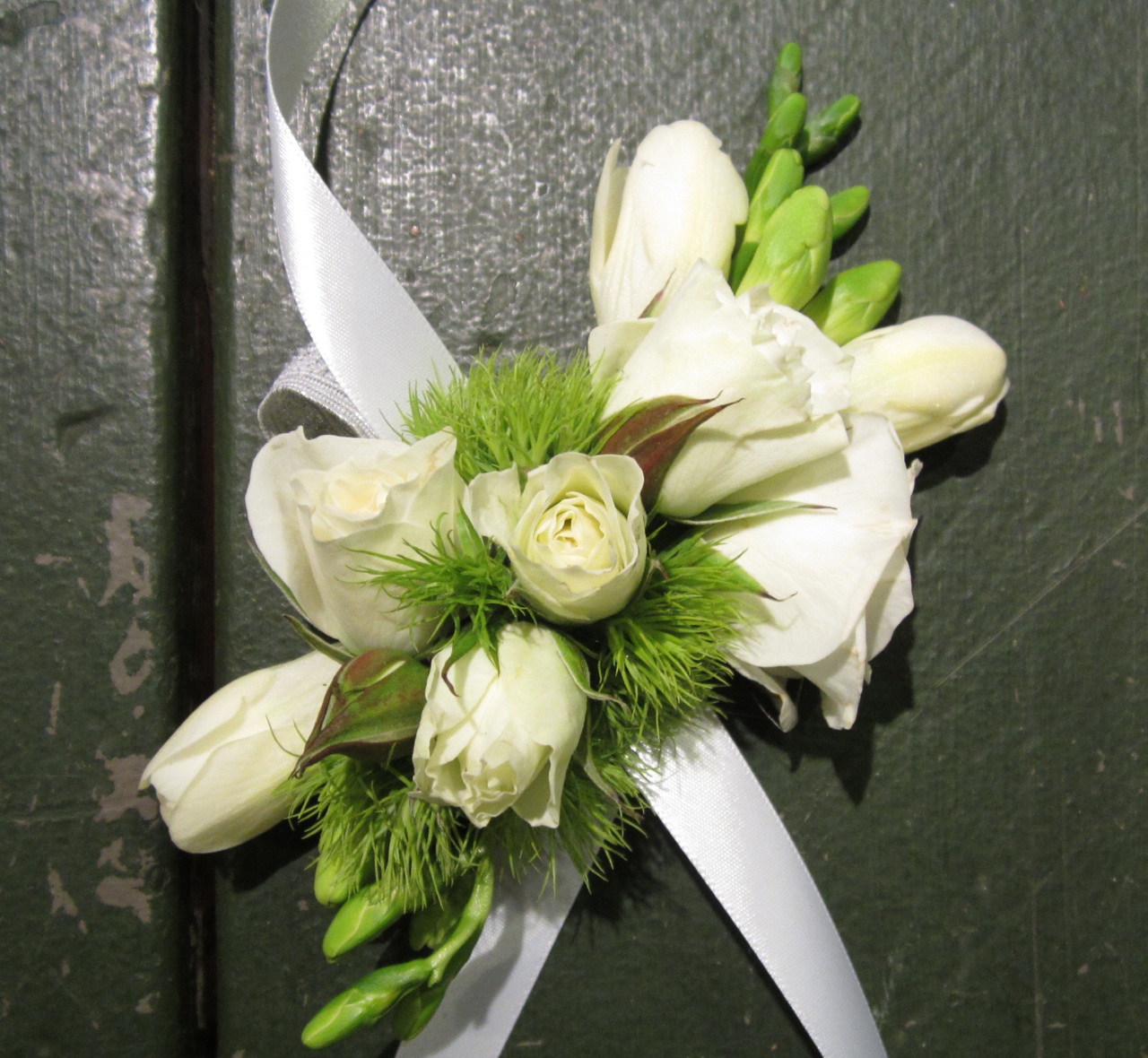 Sammy’s Flowers White wedding corsages
