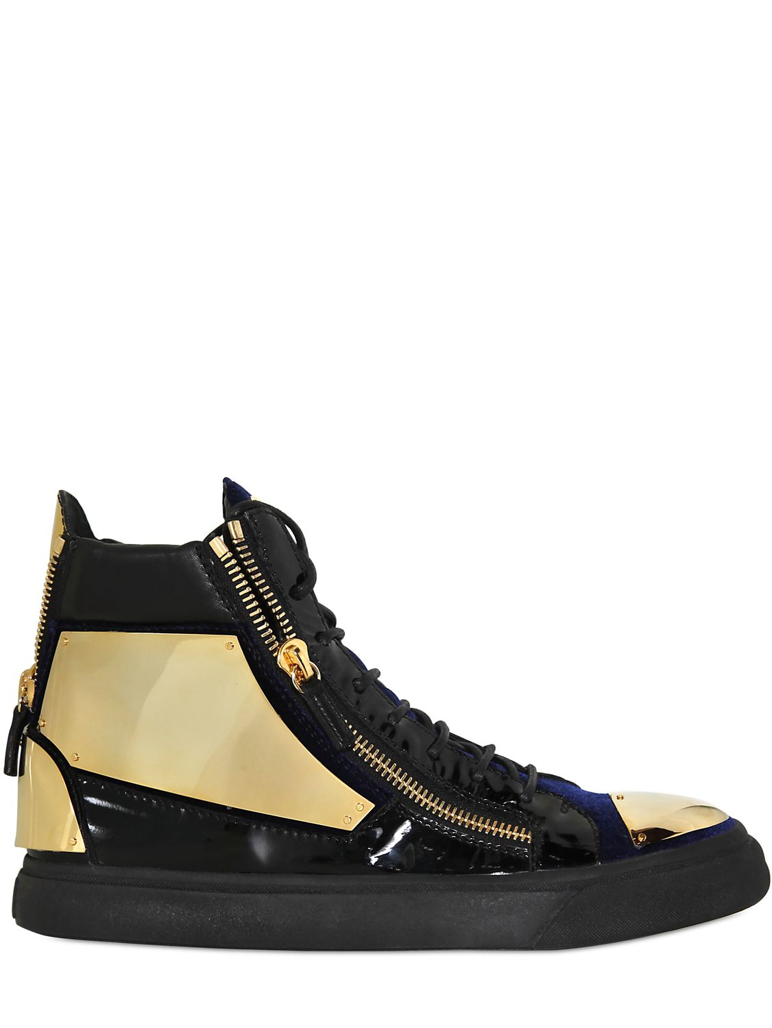 Will.i.am at LAX airport with Burberry Prorsum studded t-shirt and Giuseppe Zanotti Homme sneakers