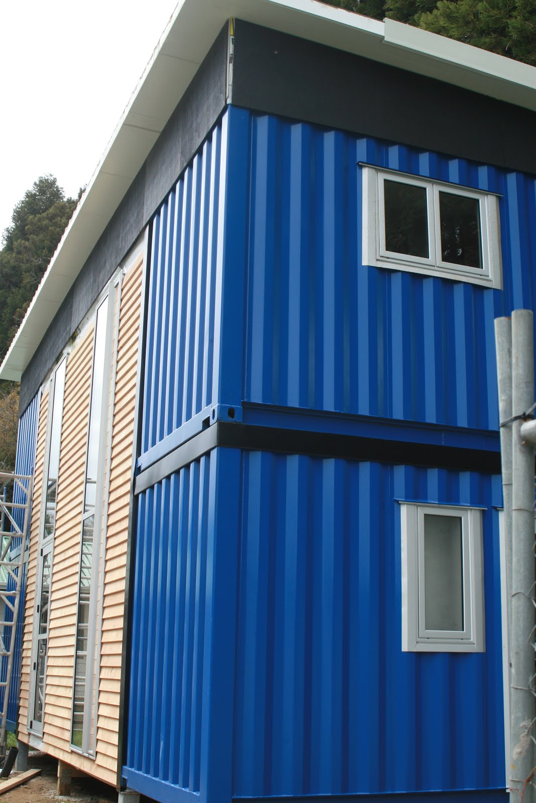imaginit design Windows and cladding for the shipping container home...