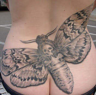 lower-back tattoo: a Death's Head Hawk Moth