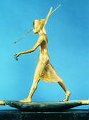 Model of the Pharaoh Tutankhamun on a reed boat spearing fish