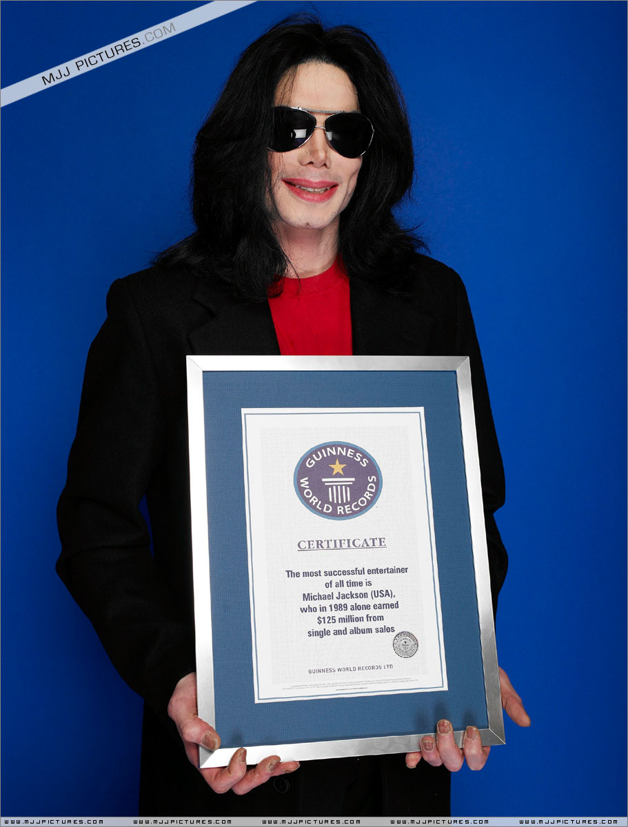 michael-poses-with-his-seven-guinness-world-records-awards(255)-m-8.jpg