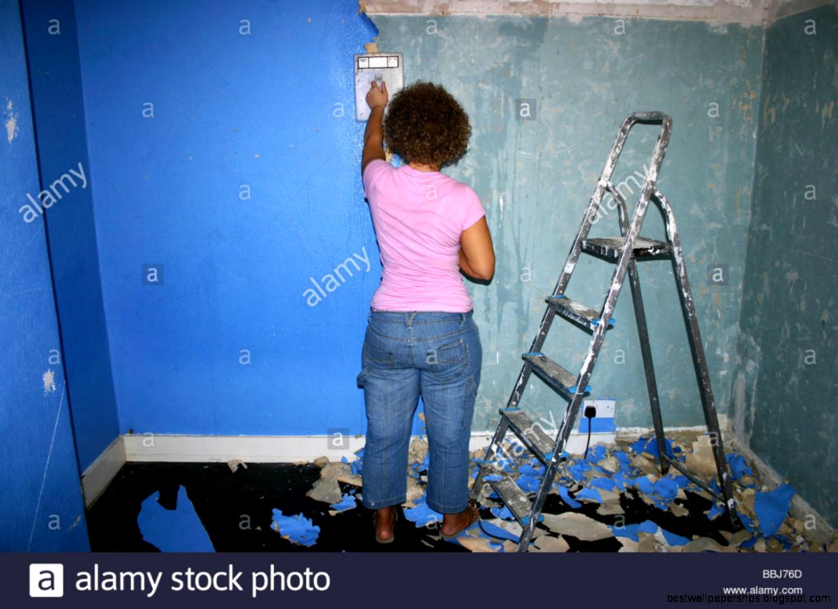 Young Woman Stripping Wallpaper Stock Photo Picture And Royalty Young Woman Stripping Wallpaper Stock Photo Picture And Royalty