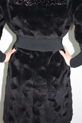 black oval mink knee length fur coat rear side