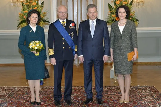Queen Silvia and King Carl XVI Gustaf  of Sweden pose with Finland's President Sauli Niinisto and his spouse Jenni Haukio at the Presidential Palace in Helsink