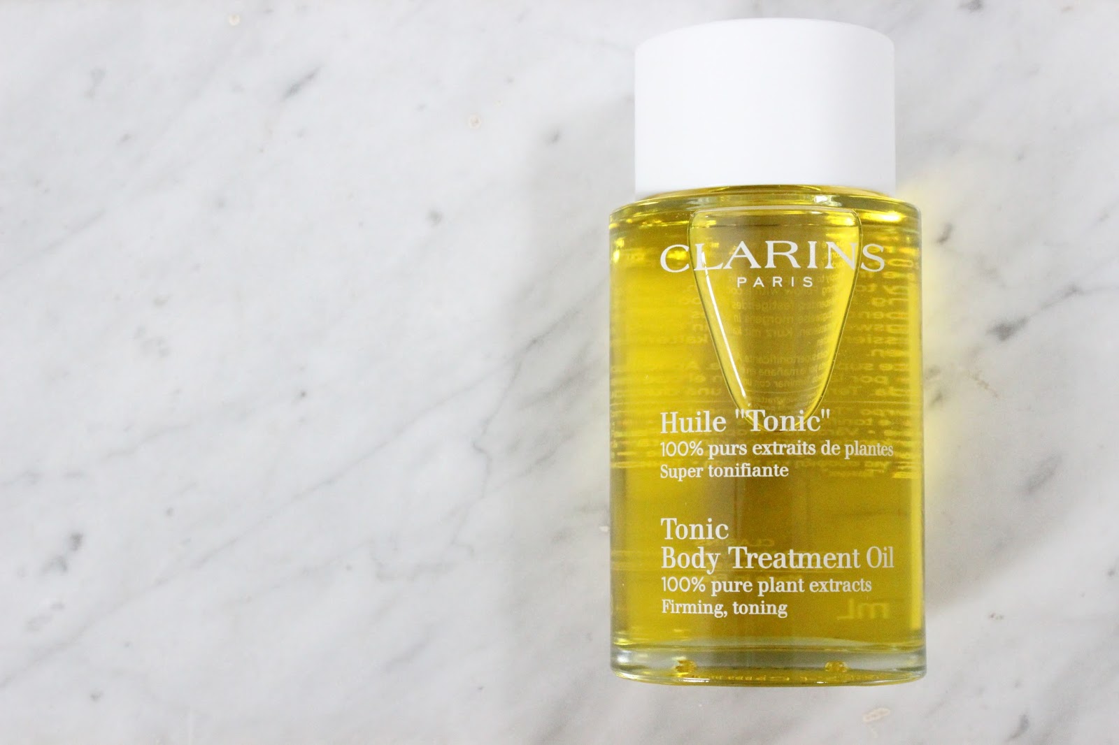 Clarins Tonic Body Treatment Oil a little pop of coral.