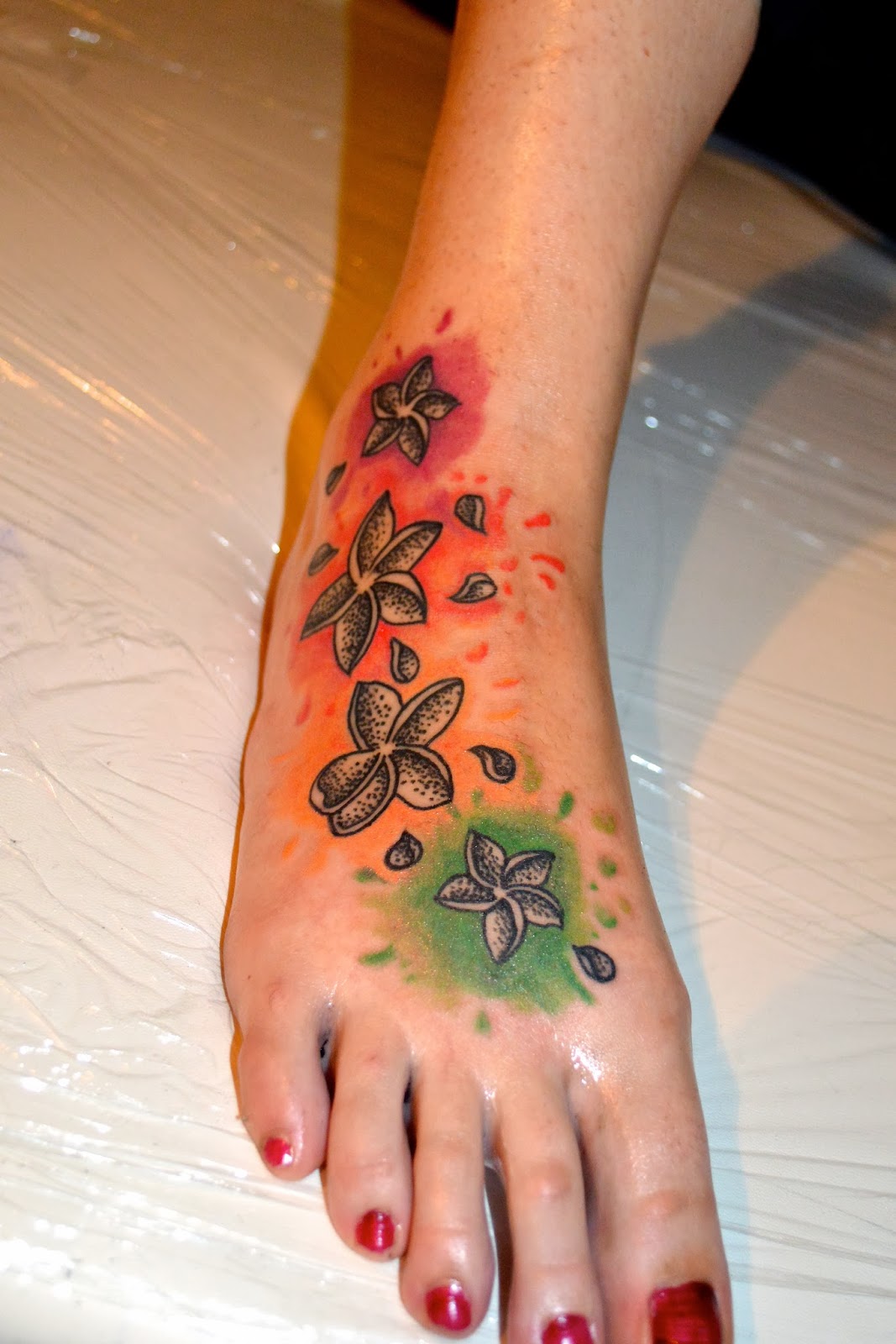 Emilie Tattoo Dotwork flowers & color splash tattoo