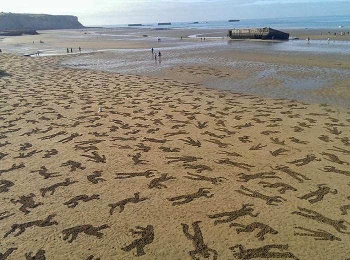Sand Artists Create D-Day Commemorative Piece with 9000 "Shadow" Drawings