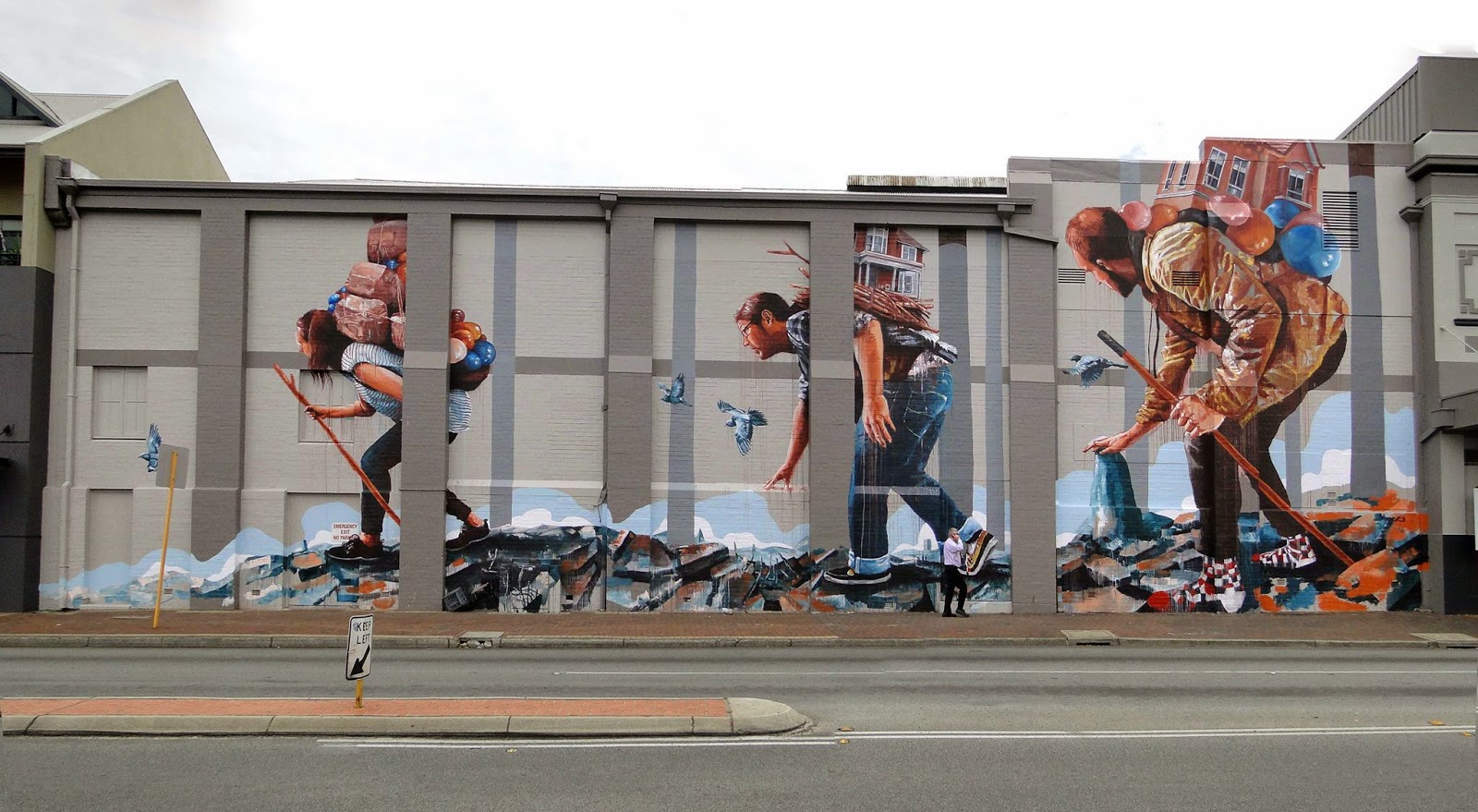 Fintan Magee paints "The Migration", a new mural in Perth, Australia