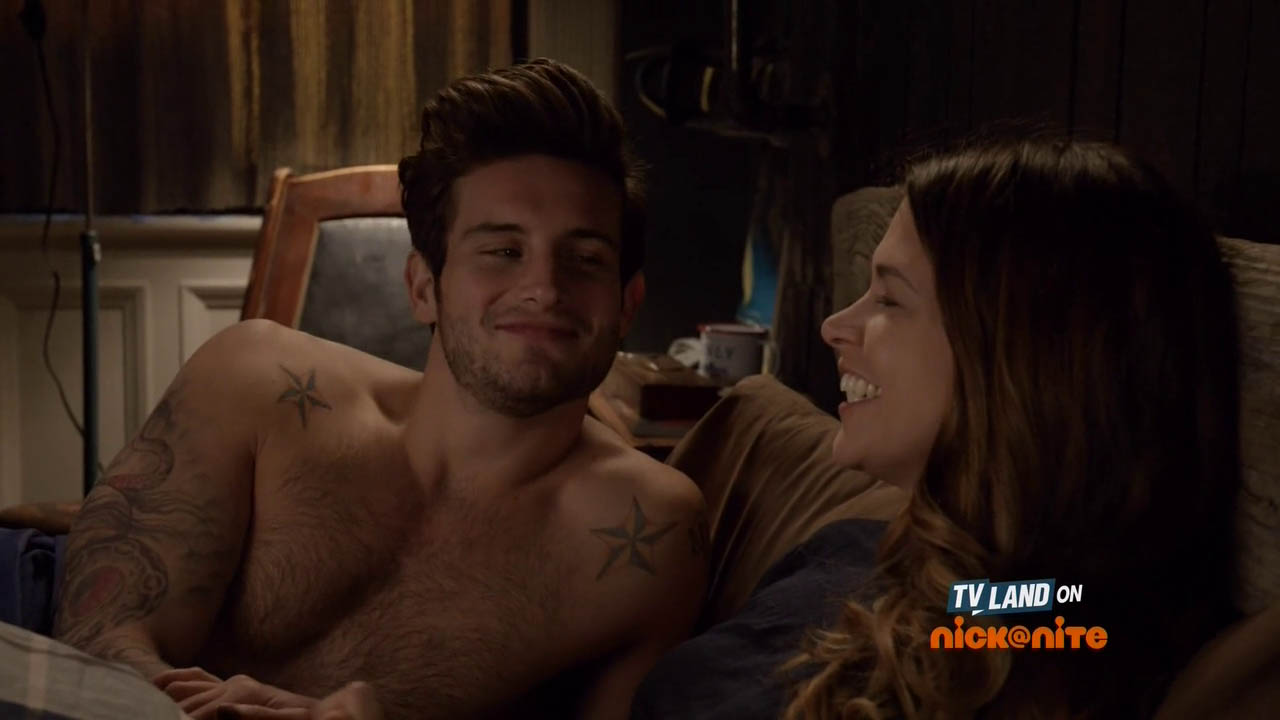 Nico Tortorella shirtless showing off his tattoos.